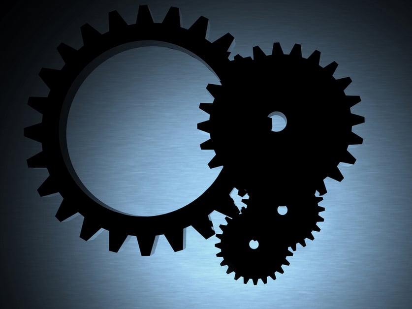 engineering cogwheels backlit over a metal texture - 3d render